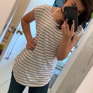 green envelope gray and white striped shirt